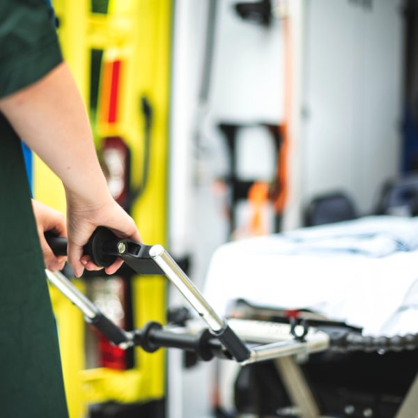 Paramedics at work with an ambulance Paramedics at work with an ambulance